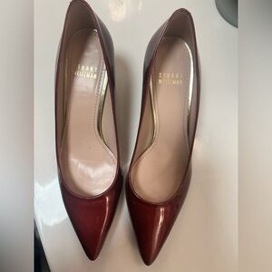 STUART WEITZMAN RED PATENT LEATHER PUMPS. Pointy toes worn once size 5. Stunning